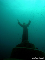 The call of the Christ of the Abyss.

"Il Cristo degli ... by Marco Faimali 